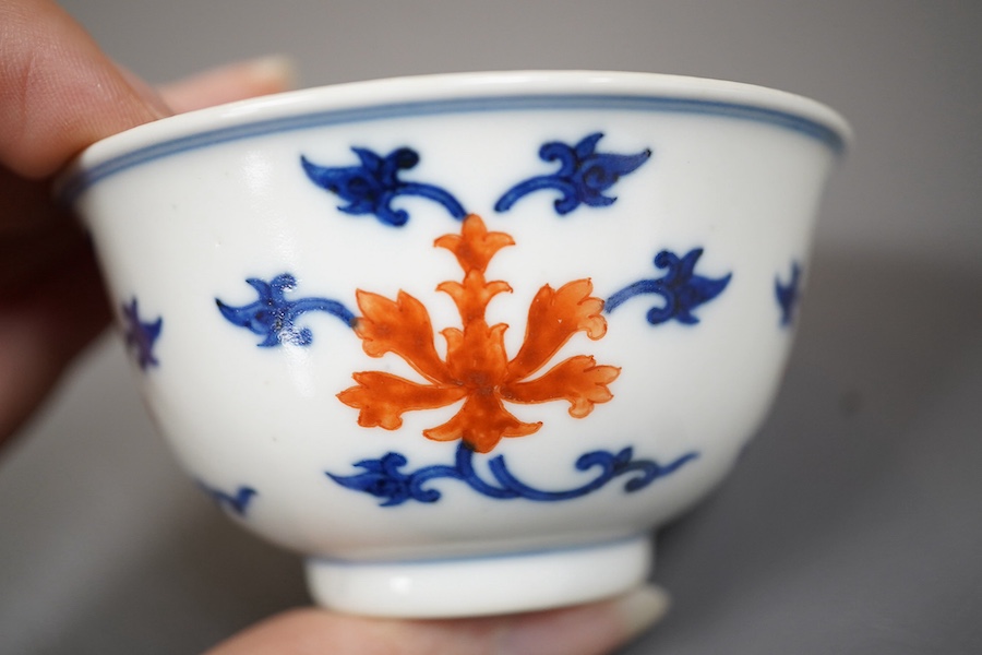 A Chinese underglaze blue and iron red bowl, Daoguang seal mark and possibly of the period
